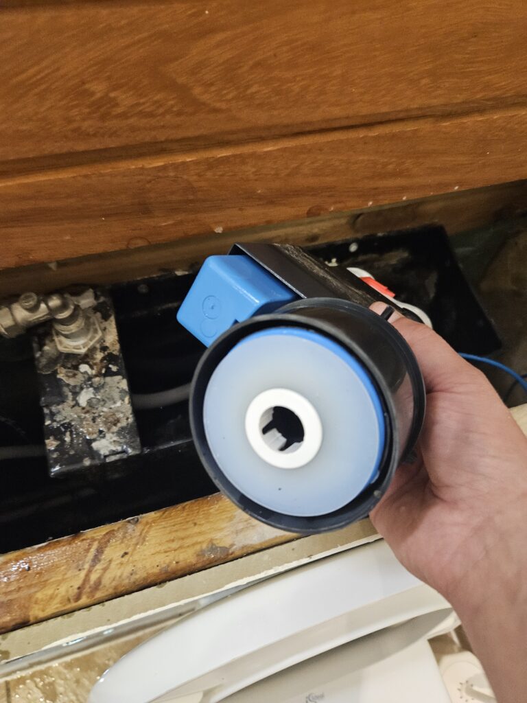 Toilet constantly running? Sometimes all it needs is a new seal on the Syphon